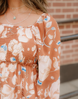 Close-up of Felicity floral dress with smocked bodice and square neckline