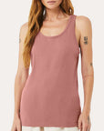 Female model wearing a mauve Bella + Canvas 3480 Unisex Jersey Tank on a neutral background — soft lightweight cotton blend tank ideal for custom printing by Lumiere Vive.
