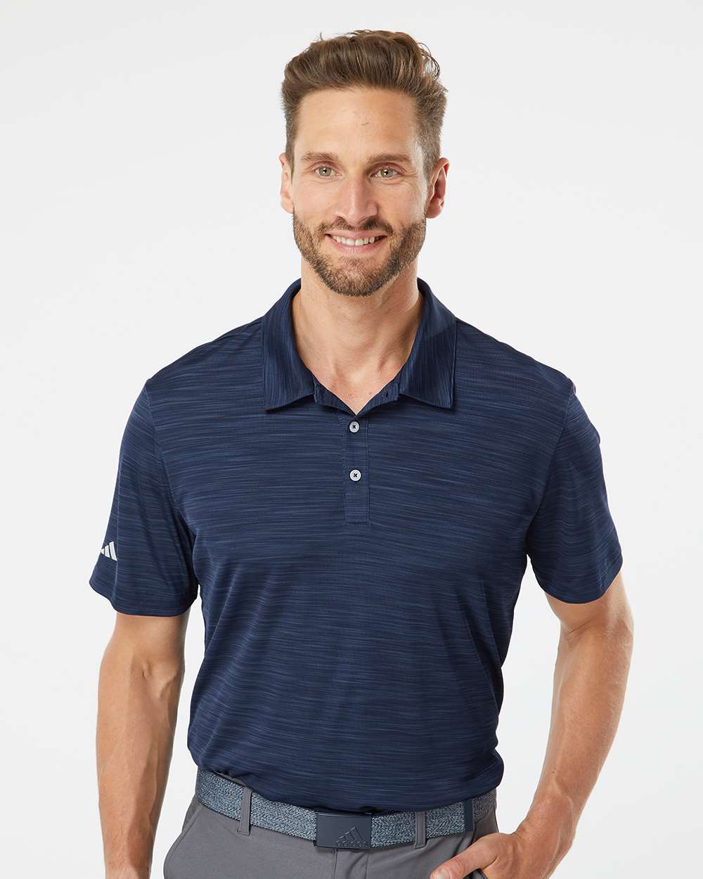 Adidas A402 Men’s Blend Polo made from recycled moisture-wicking fabric, shown with a modern fit and right-sleeve adidas logo. Ideal for custom printing