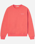 Red sweatshirt with a brand logo on a light gray background