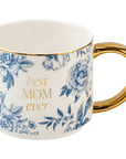Best Mom Ever cream coffee mug with blue floral artwork, gold lettering, a gold rim, and gold handle