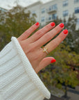 Cross ring with clear gem accents, front product view