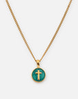 Emerald Agape necklace with a round green pendant, gold-tone cross, and gold-tone curb chain