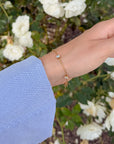 Side view of the delicate Everlight gemstone link bracelet worn on a wrist