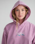 Close-up of a woman wearing the God’s Promises Hoodie with the hood up.