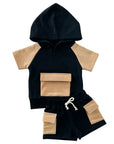 Black and beige children's hoodie and shorts set on a white background