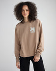 Model wearing the Jesus Changes Everything dune long sleeve tee with black pants