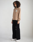 Side view of the Jesus Changes Everything long sleeve tee showing its relaxed fit
