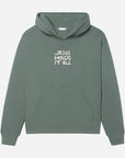 Green hoodie with 'Jesus Holds It All' text on a white background