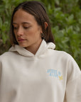 Front close-up of the Nimbus Cloud Jesus Is Alive Unisex Hoodie showing the small chest design