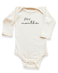 Cream organic cotton long sleeve baby bodysuit with five months lettering.