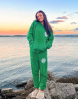 Our World Needs Jesus Green Sweatpants