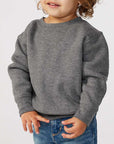 Toddler wearing a gray Rabbit Skins 3317 fleece crewneck sweatshirt made from a soft cotton blend, shown from the waist up against a neutral background.
