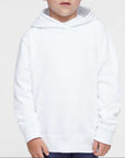 Young boy wearing a white hoodie against a plain background