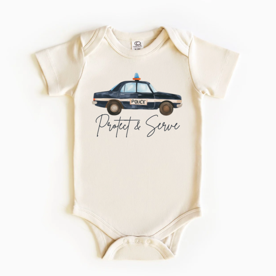 A white bodysuit with a police car illustration and the text 'PROTECT & SERVE' on the front.