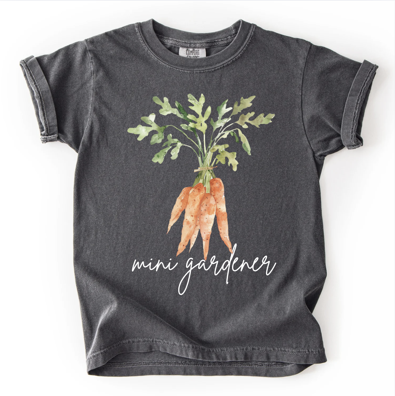 Children's t-shirt with carrot design and 'mini gardener' text on a white background