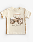 A beige neutral tee shirt top with a graphic print of a tractor and the text 'Mini Farmer' on the front.