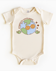 Praying for World Peace – Infant Christian Bodysuit with Earth & Peace Symbol