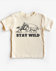 Neutral colored toddler t-shirt with 'Stay Wild' text and a cowboy and horse graphic.