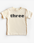 “Three” 3rd Birthday Tee – Neutral Toddler T-Shirt (Multiple Fits & Styles)