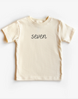 “Seven” 7th Birthday Tee – Neutral Children’s Shirt (Multiple Fits & Styles)