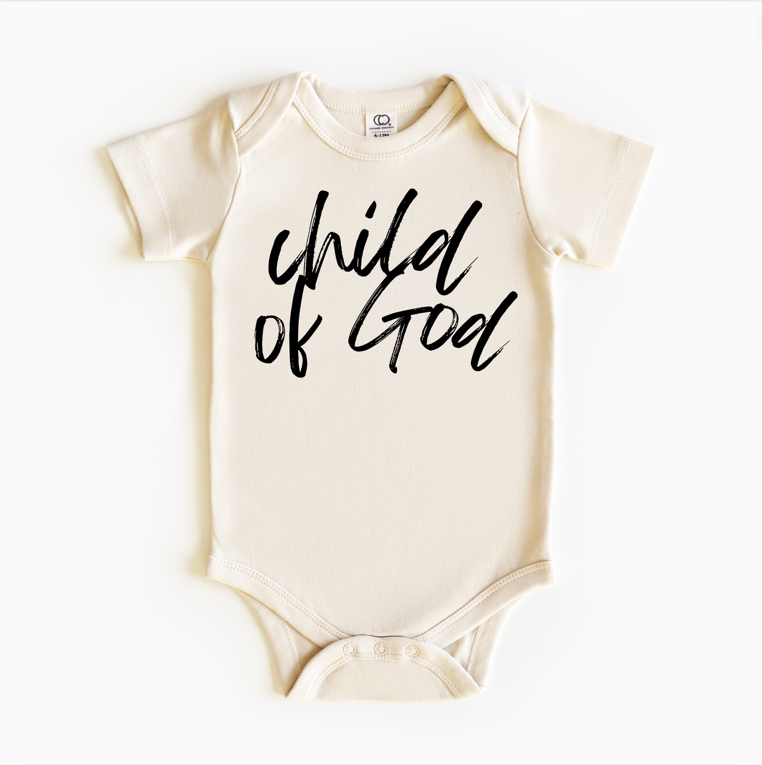 A gender neutral beige bodysuit onesie with the text 'Child of God' printed on the front.