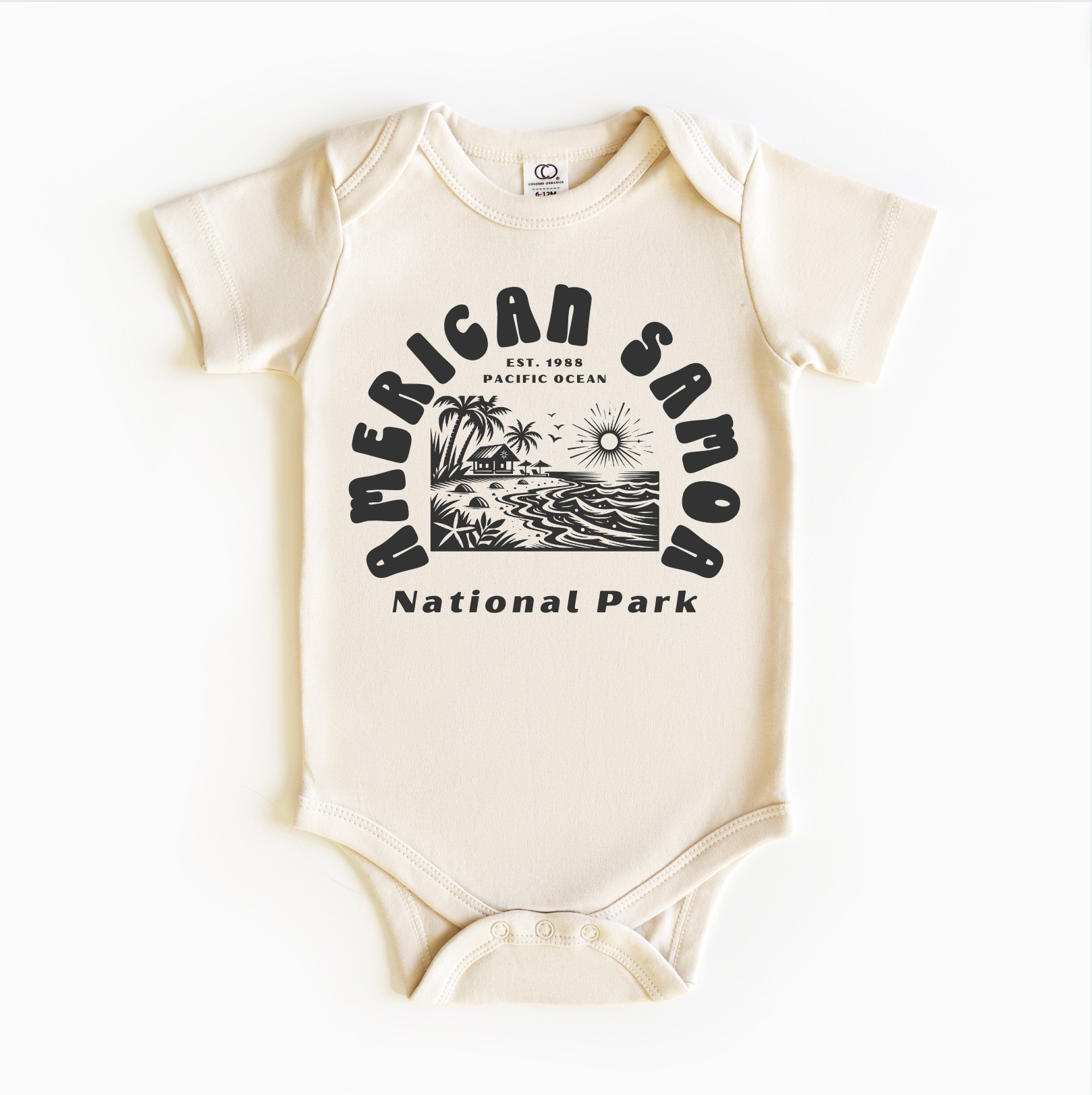 A white bodysuit with a graphic print related to the American Samoa National Park.