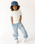 Child wearing an indigo WWJD denim bucket hat, front view