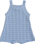 Light blue knitted dress with a pattern on a white background