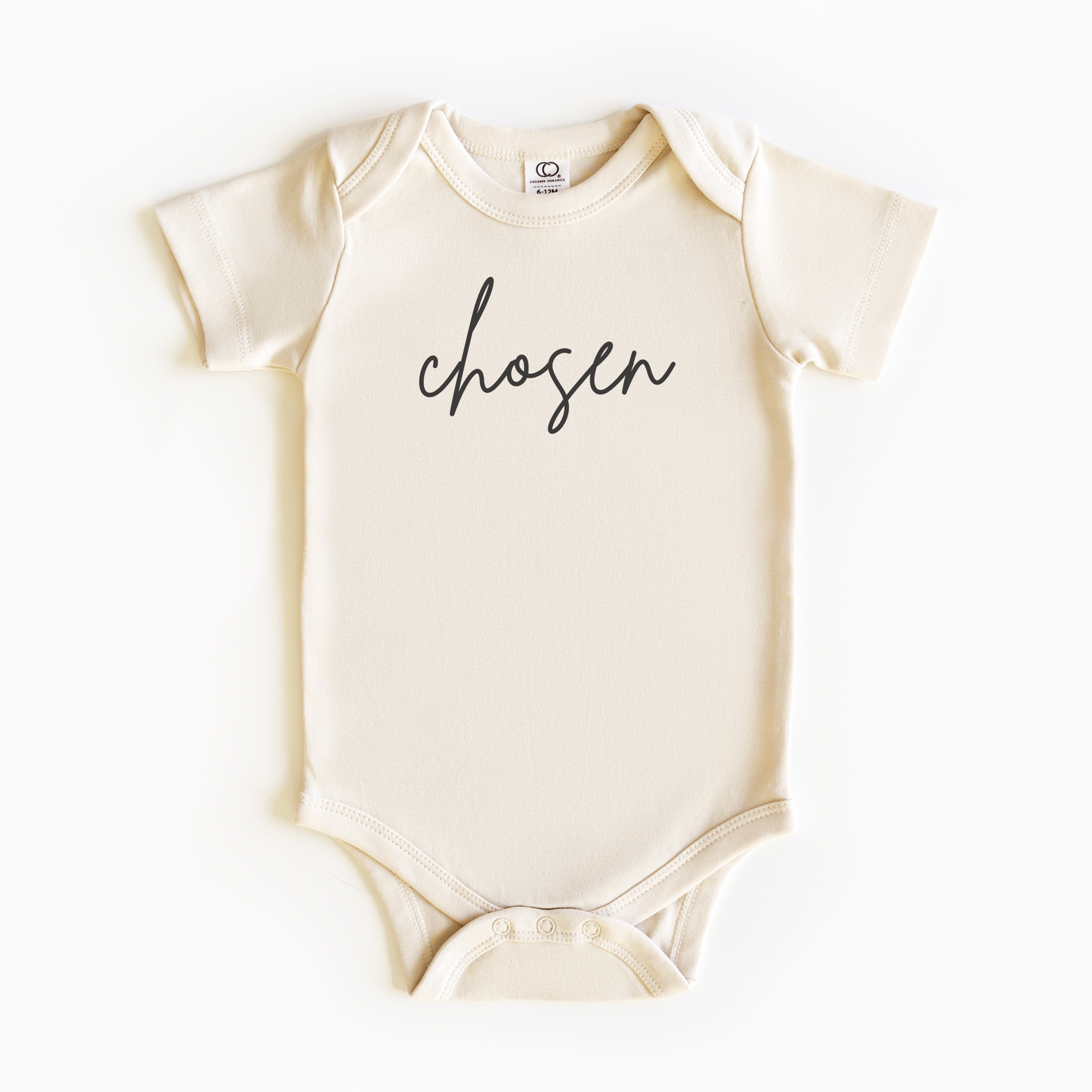 Baby wearing “Chosen” affirmation bodysuit – Christian script design organic cotton outfit by Lumiere Vive