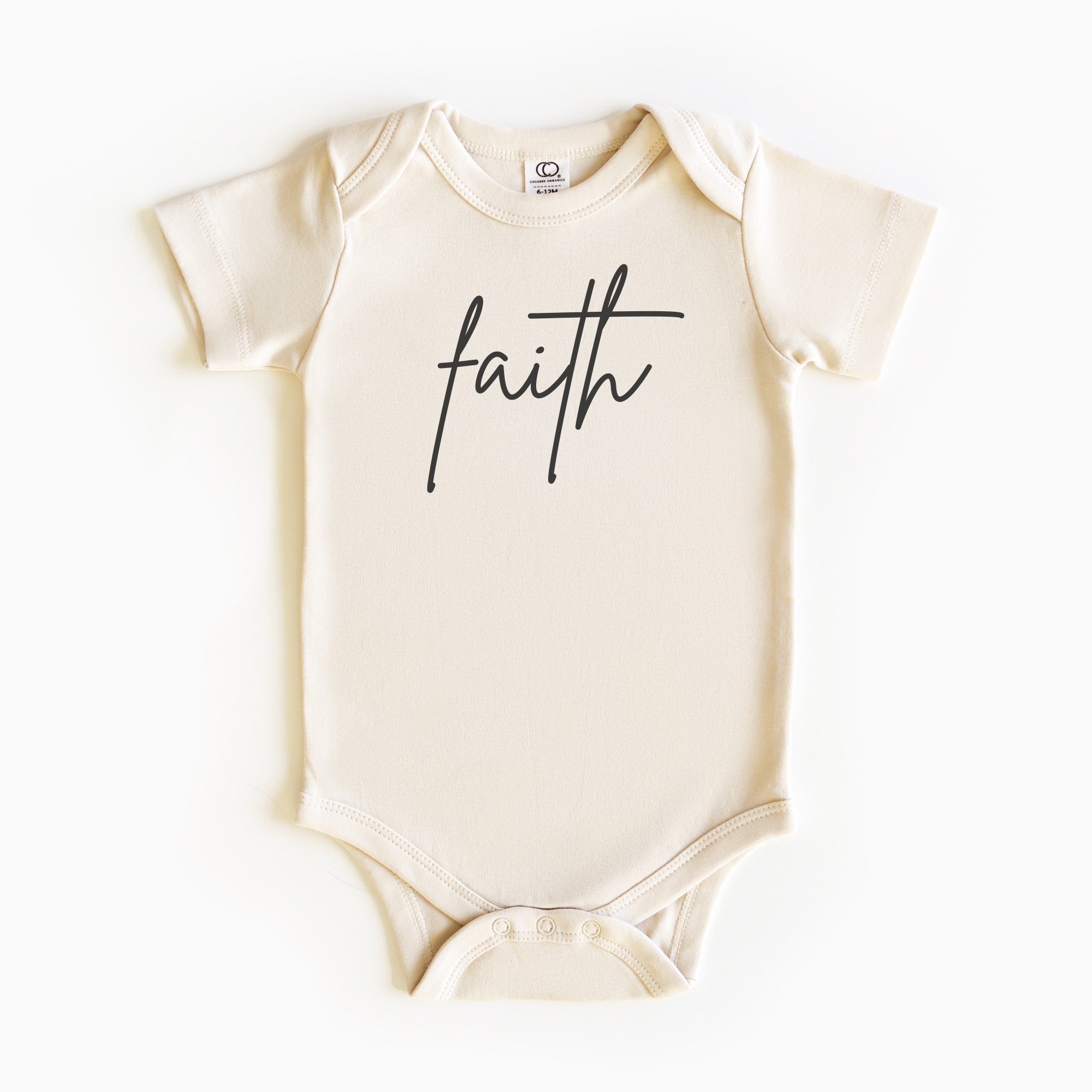 Baby wearing “Faith” affirmation bodysuit – Christian script design organic cotton outfit by Lumiere Vive