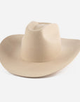 Beige cowboy hat on a white background