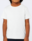 Toddler boy wearing a white Gildan 5100P heavy cotton tee, front view, ideal for custom printing