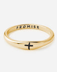 Gold ring with 'Promise' and a cross on a white background