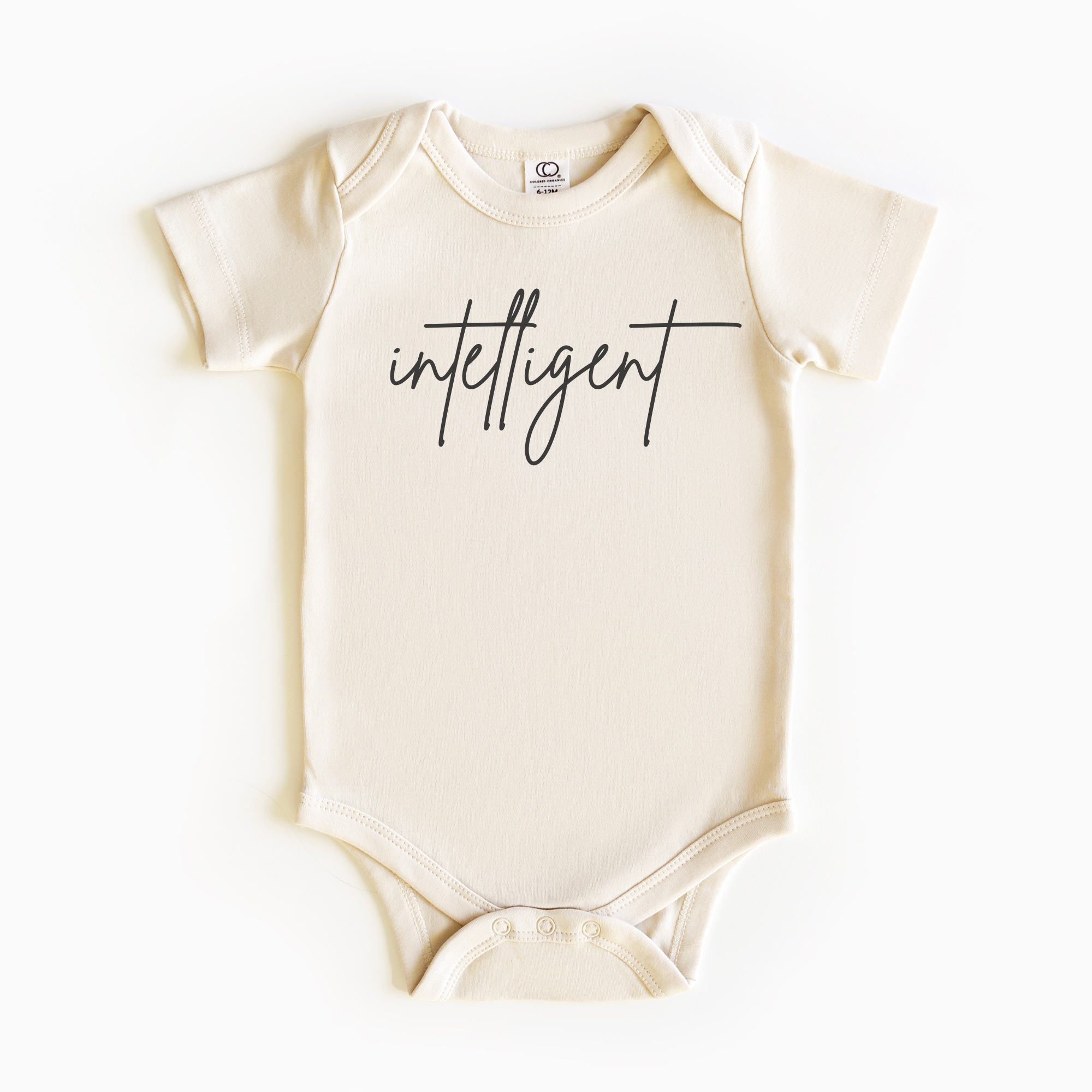 Baby wearing “Intelligent” affirmation bodysuit – Christian script design organic cotton outfit by Lumiere Vive