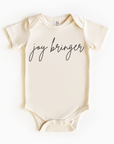 Baby wearing “Joy Bringer” affirmation bodysuit – Christian script design organic cotton outfit by Lumiere Vive