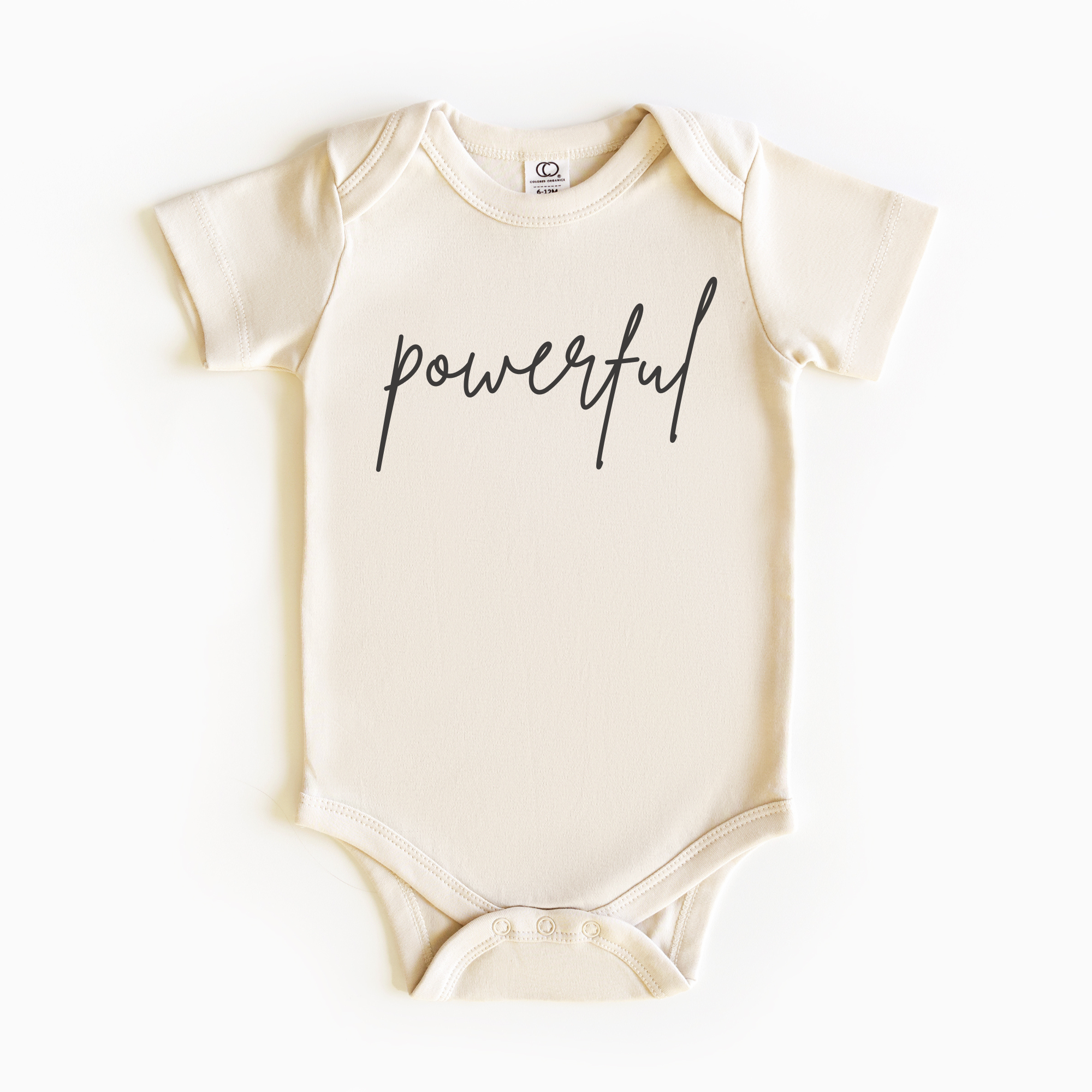 Baby wearing “Powerful” affirmation bodysuit – Christian script design organic cotton outfit by Lumiere Vive