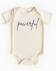 Baby wearing “Powerful” affirmation bodysuit – Christian script design organic cotton outfit by Lumiere Vive