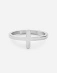 Silver-tone cross ring with a smooth cross and slim band on a white background