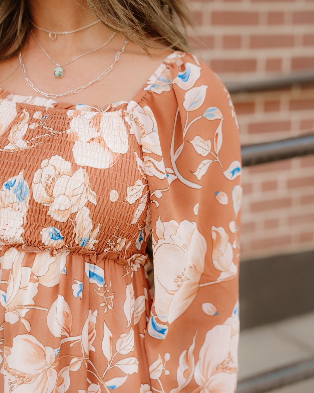 Close-up of Felicity floral dress with smocked bodice and square neckline