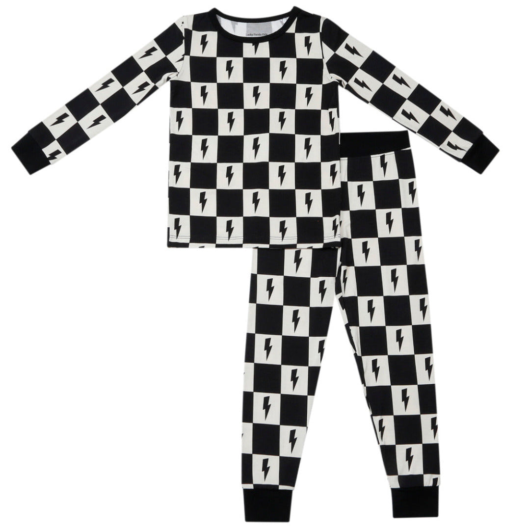 Black and white checkered pajama set with lightning bolt pattern on a white background