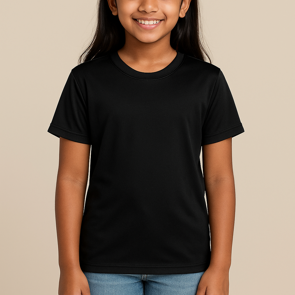 Young Indian girl wearing a black Badger 2120 Youth B-Core T-Shirt on a neutral beige studio background — moisture-wicking athletic blank ideal for custom printing by Lumiere Vive.
