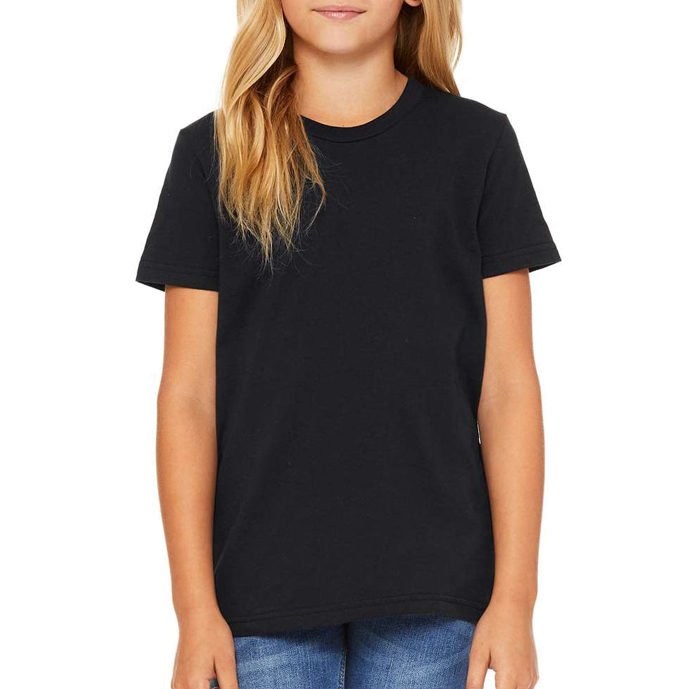 Young girl wearing a black Bella + Canvas Youth Jersey T-Shirt with a soft, classic fit — perfect for custom printing, school apparel, and everyday wear by Lumiere Vive.