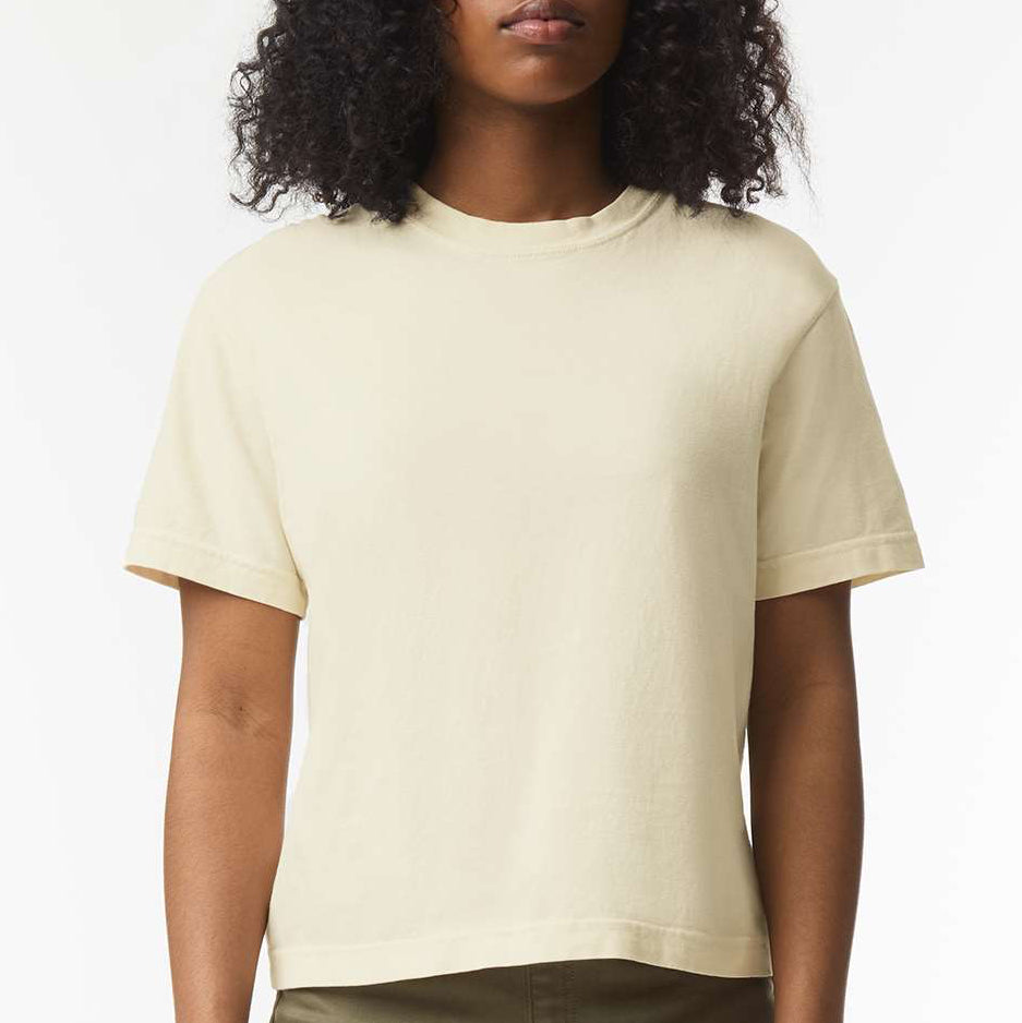 Woman wearing a light ivory Comfort Colors cropped t-shirt with a relaxed, boxy fit — perfect for custom printing or casual, elevated everyday wear by Lumiere Vive.