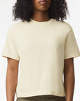 Woman wearing a light ivory Comfort Colors cropped t-shirt with a relaxed, boxy fit — perfect for custom printing or casual, elevated everyday wear by Lumiere Vive.