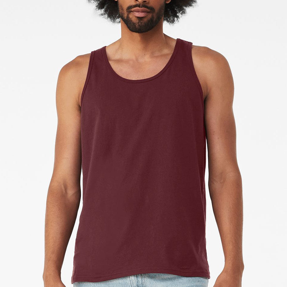 Male model wearing a maroon Bella + Canvas 3480 Unisex Jersey Tank on a white background — lightweight cotton blend tank ideal for custom printing by Lumiere Vive.