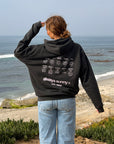 Back of black Always Sunny With Jesus hoodie with sun-themed graphic