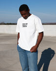Ask Me About Jesus heavyweight cream T-shirt, front product view