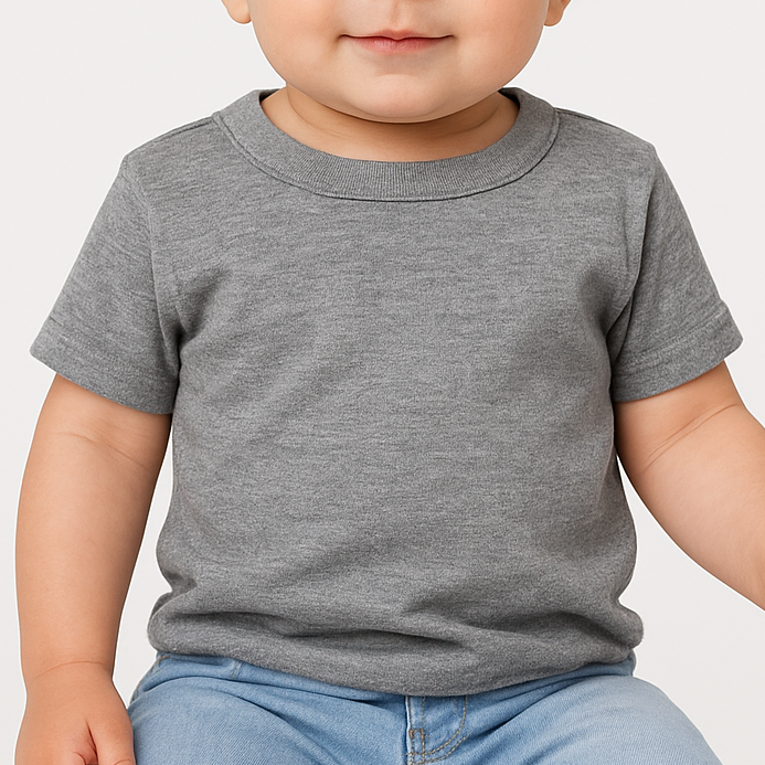 Baby girl wearing a neutral grey triblend BELLA+CANVAS infant t-shirt, photographed in soft natural lighting for the Lumiere Vive custom apparel collection.