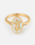 Bloom Again Enamel Ring with an oval enamel centerpiece, gold-tone botanical motif, and delicate side accents